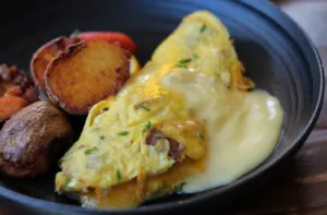 Omlette and potato wedges