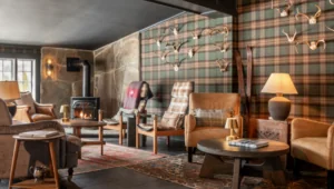 Furniture and a burning fire place at the Wentworth.