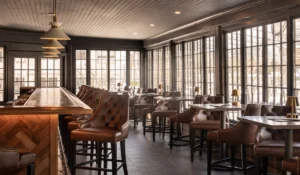 Bar, tables, and chairs at the Wentworth Inn
