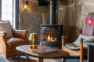 Fire place with chairs at the Alpine