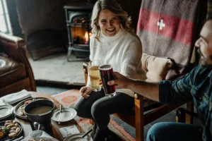 Couple clinking their glasses together