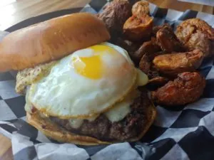 Hangover Burger with potato wedges