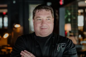 A culinary team member wearing a Wentworth shirt.